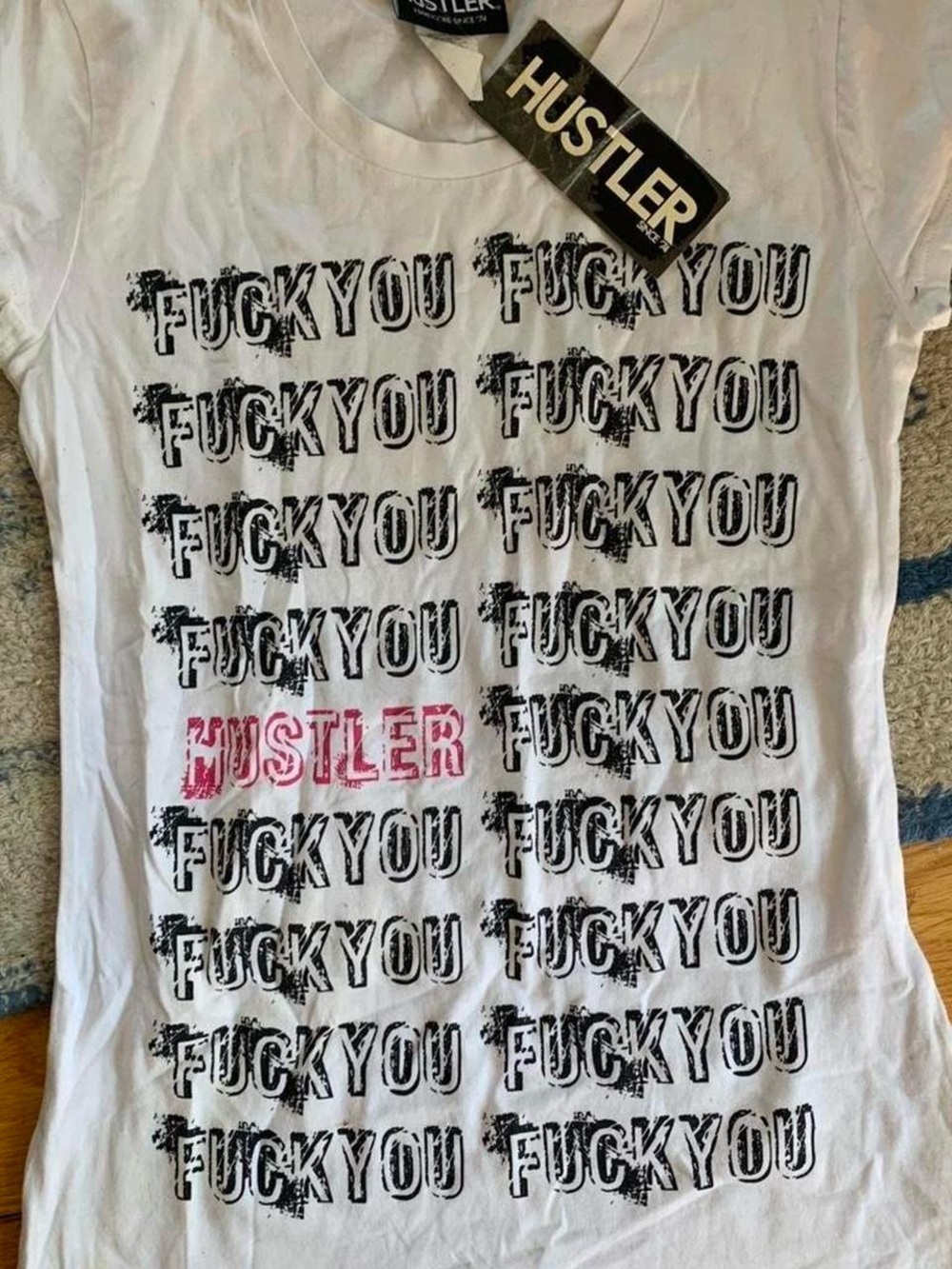 HUSTLER White Graphic Tee with Repeated Black Text